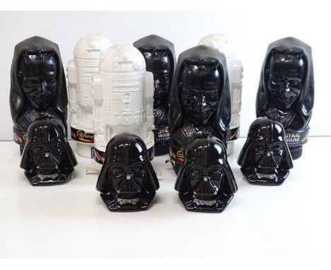 A group of STAR WARS Cadburys (empty) chocolate boxes  in the form of R2D2 and Darth Maul together with 4 x Darth Vader - as 