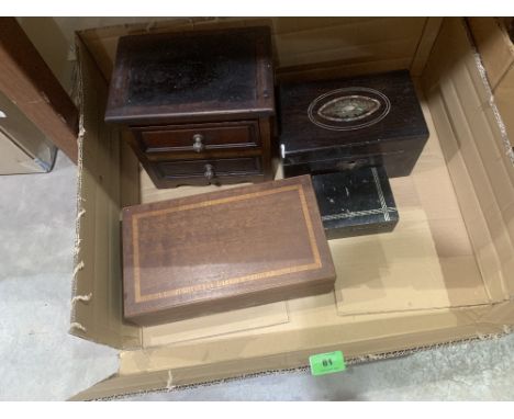 A rosewood tea caddy, two treen boxes and a miniature chest of two drawers
