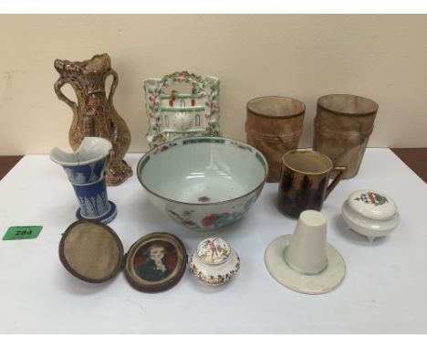 A pair of alabaster beakers, a Staffordshire spill holder, a Linthorpe pottery mug, a Chinese famille-rose vase, cased miniat