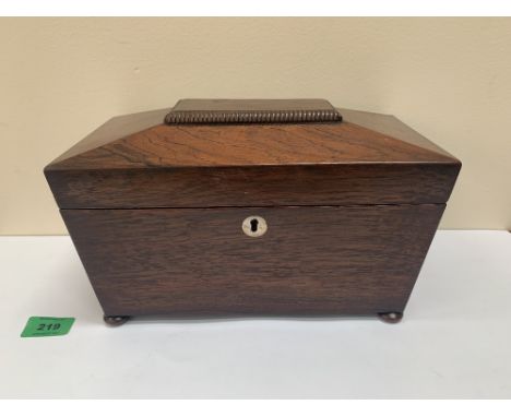 A Regency rosewood sarcophagus tea caddy. 11' wide