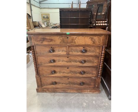 A Victorian Scottish mahogany chest of two short over three long drawers flanked by bobbin turned pilasters, under a frieze d