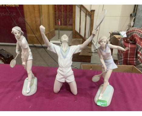 Three Lladro bisque porcelain tennis figures. 14½'; 12'; 11' high