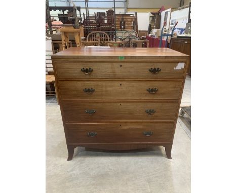 A 19th century mahogany chest of four long graduated drawers on splayed bracket feet. 39' wide. Bottom drawer veneer lifting
