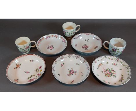 A collection of five early English saucers together with three cups all decorated polychrome enamels 
