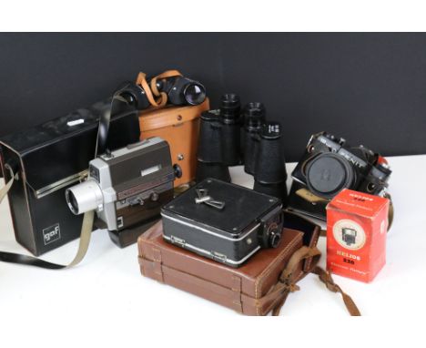 A cased Zenit 12 XP 35mm SLR Camera fitted with a Helios 44M-4 58mm f/2 lens and boxed Helios 22 Flash together with two pair