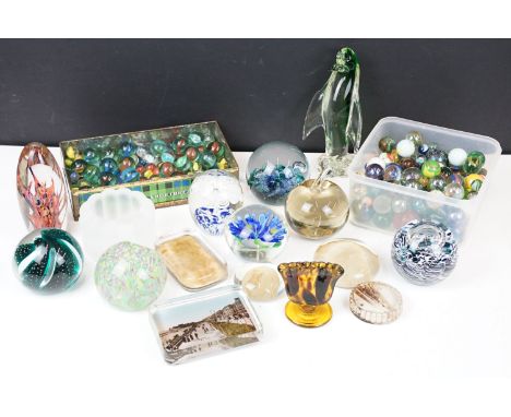 Glass paperweights in varying designs and sizes including Caithness, Selkirk glass 'seaburst', a Strathearn oblong, a green d