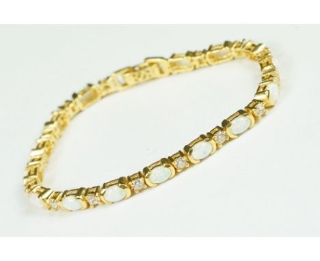 Gold plated on silver opal cabochon bracelet 