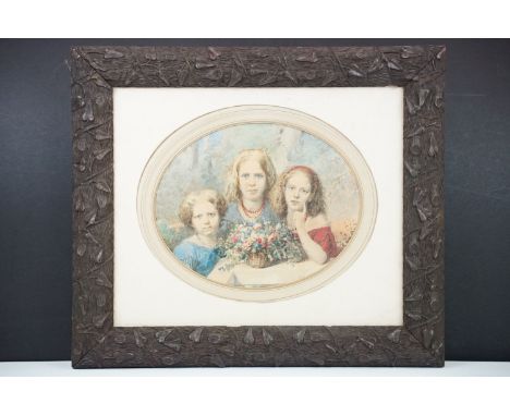 Tito Agujari (1834 - 1908), an oval portrait of a mother and two daughters, watercolour, 19.5 x 24.5cm, framed and glazed 