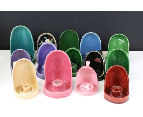 Collection of anti Zeppelin candle holders, some dating to circa WWI period, to include: Bretby red glazed example, 13cm high