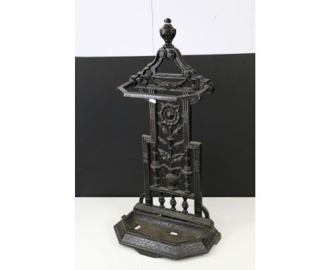 Victorian wrought iron floral decorated umbrella / stick stand with drip base. 73cm high 