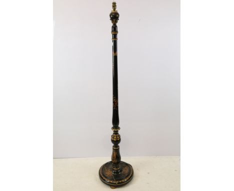 Chinoiserie standard lamp, with turned carved column, the black lacquered ground with gilded decoration, raised on three feet