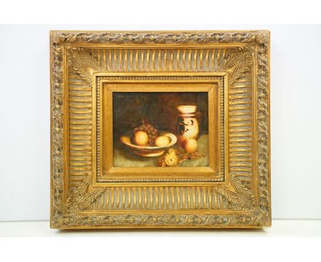Fruit in a bowl and ceramic vase in an interior, oil on panel, archive label verso, 19 x 24cm, gilt framed 