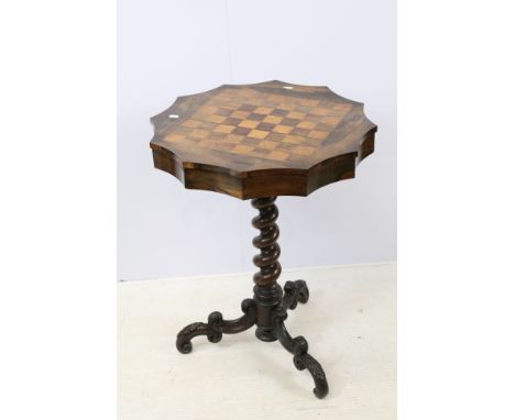 Victorian walnut inlaid twelve sided chess table, with two concealed drawers, on twisted support and carved tripod base, 75cm