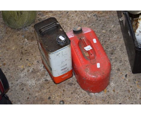 Vintage petrol can together with an oil can