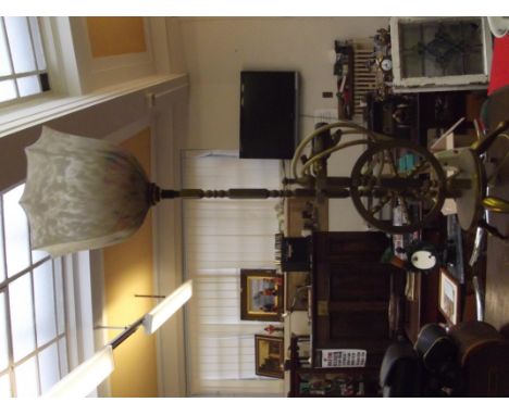 Brass lamp in the form of a spinning wheel 
