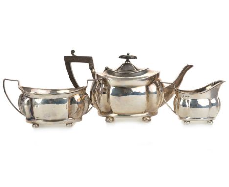 GEORGE V SILVER THREE PIECE TEA SERVICE, FENTON BROTHERS LTD, SHEFFIELD 1913 of lobed oval form, comprising teapot, twin hand