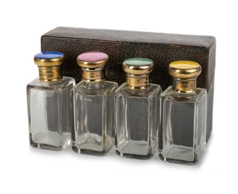 SET OF FOUR GEORGE V SILVER GILT AND HARLEQUIN ENAMEL SCENT BOTTLES, WTH, LONDON 1926 each glass bottle with guilloche enamel