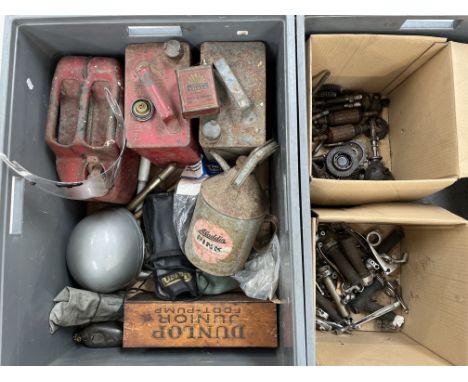 An autojumblers lotassorted control levers; twist grips; motorcycle tool kits; a Junior Shell lubricating oil application tin