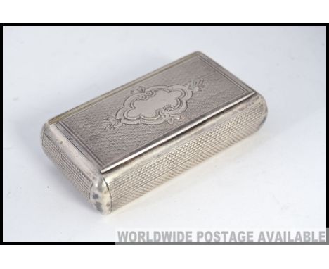An early 20th century continental  engine turned silver snuffbox being chase decorate. Total weight 48.6g
