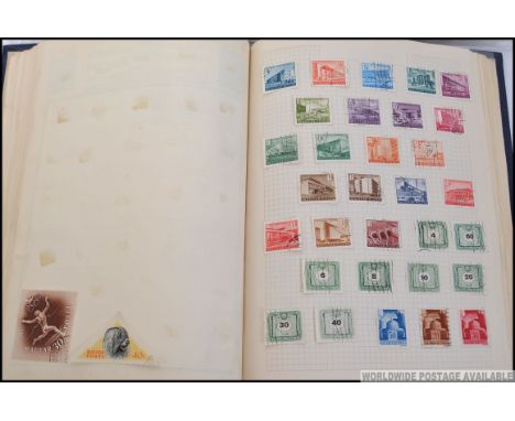 A vintage Amherst stamp album, filled with assorted overseas / foreign vintage stamps, along with 2x bags of loose stamps to 