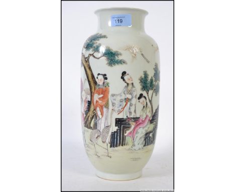 A Chinese large famille rose vase with unusual court scenes of people and storks / cranes. The base with ochre red character 