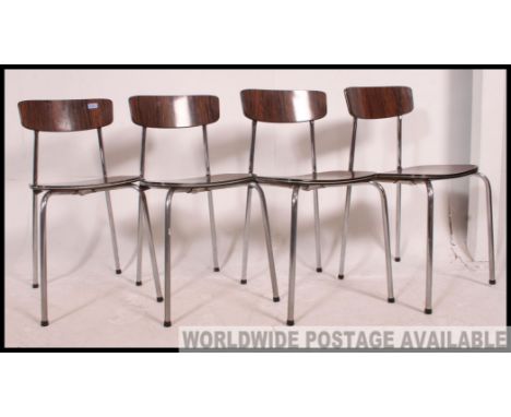 A set of 4 1970's chrome and faux rosewood tavo - Belgium kitchenette dining chairs Chrome supports with faux rosewood panel 
