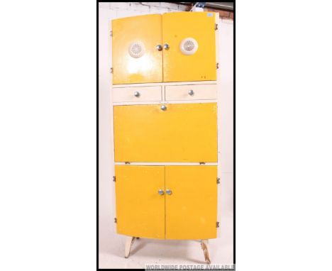 A mid century vintage two tone yellow and white kitchen cabinet comprising drawers and cupboards. Measures: 175 x 77 x 42.