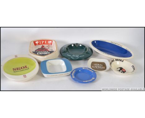 A collection of retro advertising ashtrays, to include Piper, Charles Kinloch, Martell, Fremlins, Gilbey's Gin, Skol, Envoy e