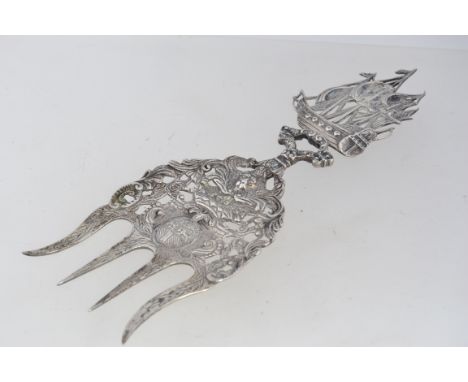 A Silver tested Dutch 19th century serving fork, bearing coat of arms under crown, below a Dutch galleon 59.7g. L19 cm