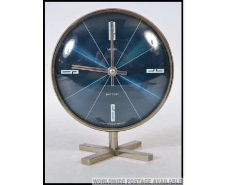 Early 1960's retro vintage ' Smiths' mantle clock.  One of their first battery powered models.  Dark dial with geometric line