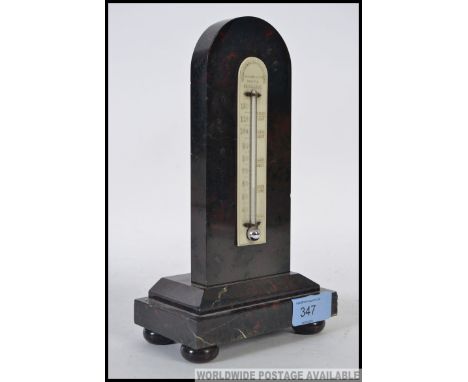 A fabulous early 20th century marble thermometer with ivorive backplate marked for the Marble & Stone Co of Penzance, Cornwal