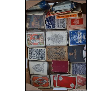 A collection of vintage playing cards and games to include advertising such as Cow and Gate, Guinness etc please refer to ima