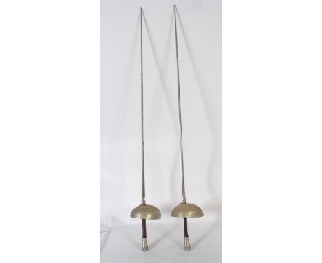 2 vintage 20th century fencing epee swords / rapiers, both with leather handles