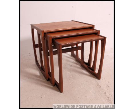 A set of retro vintage 1960's G-Plan nest of tables. Graduating three sized tables. 