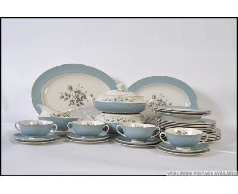 A Royal Doulton part dinner / tea service comprising cups, saucers, plates etc all in the Rose Elegans pattern ( please see i