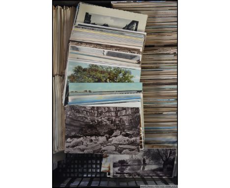 A large collection of approx 1000+ postcards dating from the early 20th century to include many topographical townscape, land