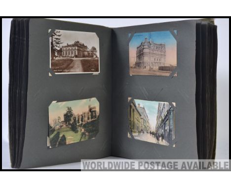 An excellent vintage 20th century postcard album consisting of topographical uk scenes to include many towns and county place