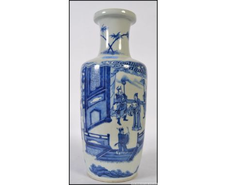 A large Chinese blue and white vase decorated with warrior scenes. The bulbous vase with waisted neck and trumpet top having 