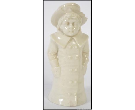 A 19th Century Royal Worcester Kate Greenaway candle snuffer " Boy with hands in pocket " bearing green marks to underside ( 