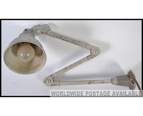 An original industrial factory anglepoise lamp for machinists. Great vintage piece with enamel shade.