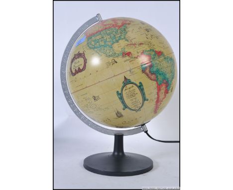 A contemporary retro style light up desk top globe by Scanglobe in working order H45cm