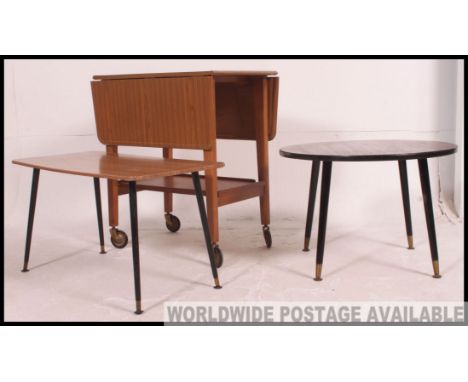 A decent pair of vintage / retro occasional tables on ebonised atomic style legs + A vintage two tier drinks trolley wiht dou