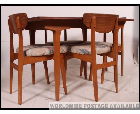 Retro vintage table in soft rectangular form and four chairs.  Table extends via a central leaf that is stored under. Measure