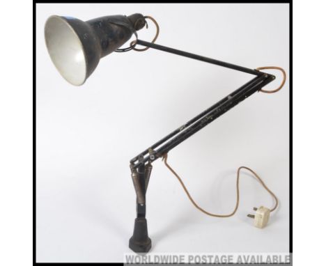 An early Herbert Terry bench mounted industrial workers anglepoise lamp, with original crabtree top.