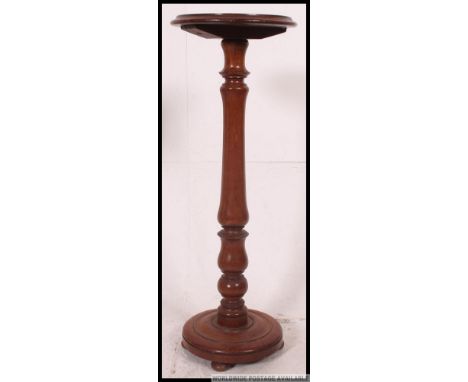 Two Victorian mahogany tripod pedestal wine table. The base raised on shaped 3 splayed legs with turned column and terraced t