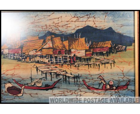 A framed and glazed Vietnamese village boat / fishing scene screen print dating to the 20th century 