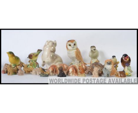 A collection of 20th century ceramic animal and bird figures to include ones by Beswick, Wade, Branstone etc Owl H12cm