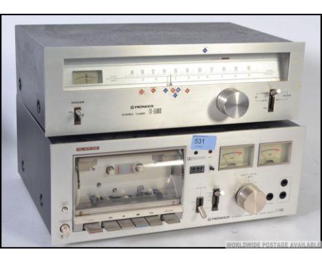 A vintage 1970's Pioneer hi-fi system / seperates comprising tape deck and tuner