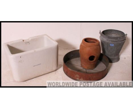 A vintage Twyfords ceramic belfast sink with notation. Together with a garden sieve and an unusual shaped galvanised metal bu