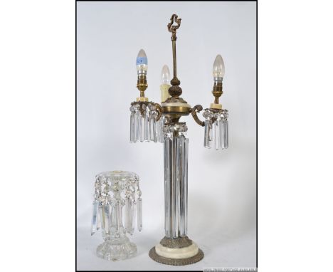 A stunning early 20th century table lamp lustre having long glass droplets under 3 branch lamp above. Together with another g